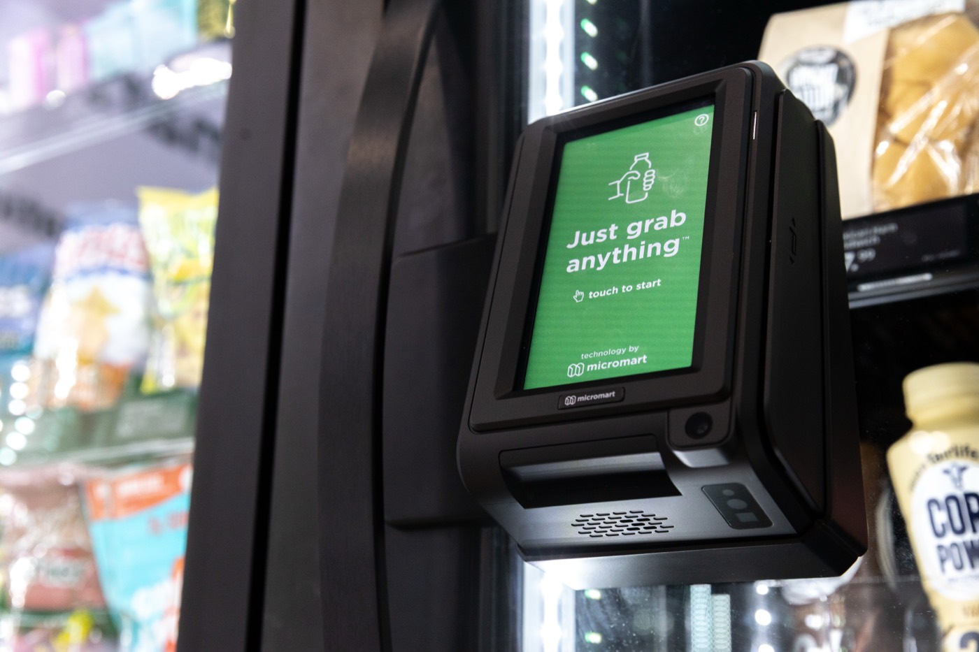 Tap-to-pay reader on a VendBeast cooler reading Just grab anything